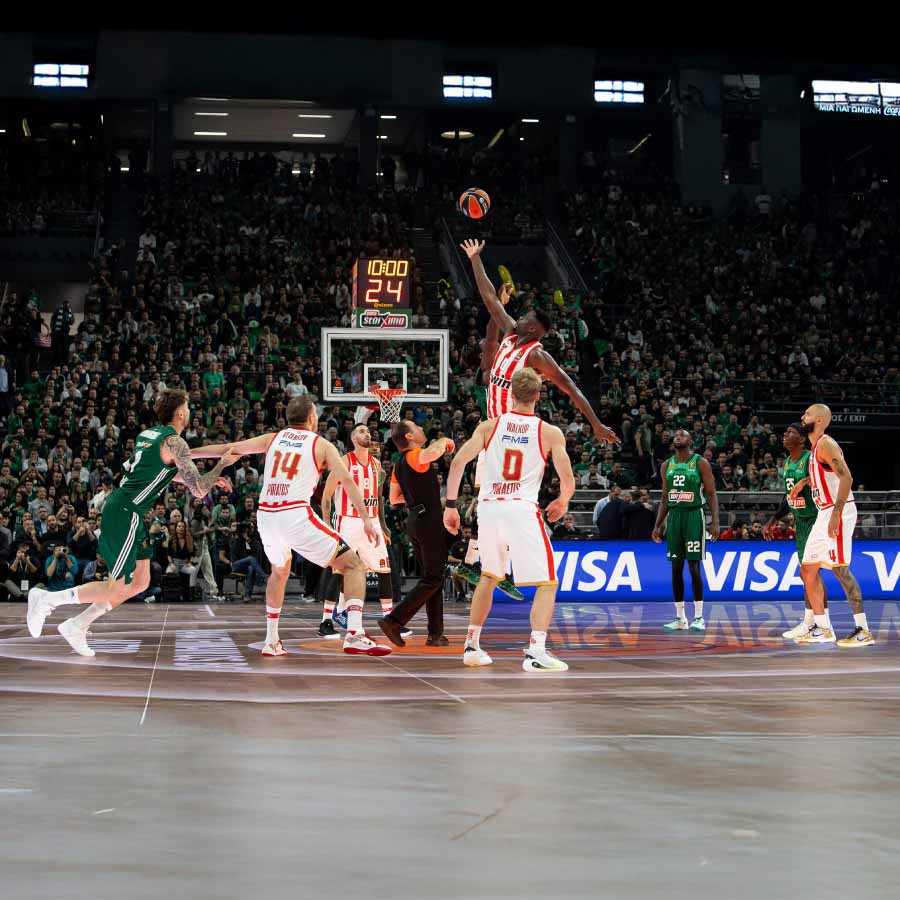 basketball players playing on court