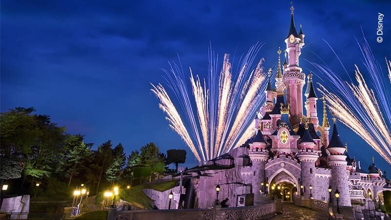 disney castle and fireworks